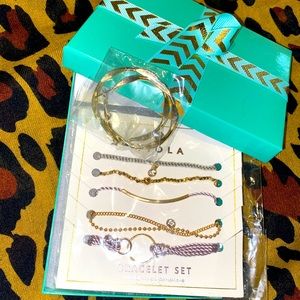 Gold bracelet and earrings set.